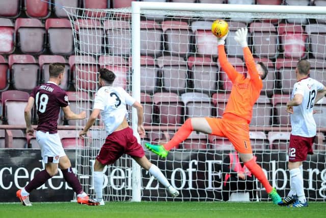 Graeme Smith makes a first half save to keep the scores level at 0-0 going in to the break.