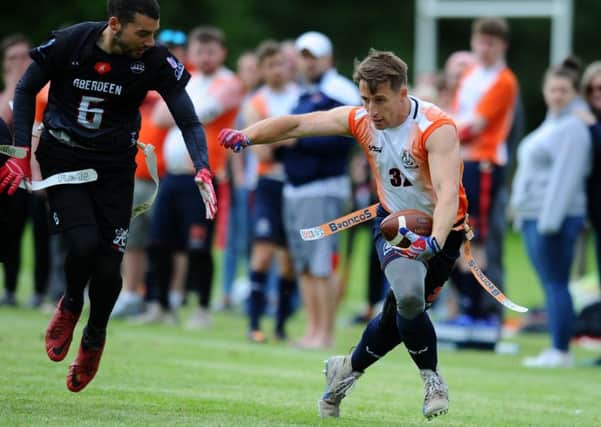 Grangemouth Broncos (orange and white) v Aberdeen Oilcats (black). (picture: Michael Gillen)