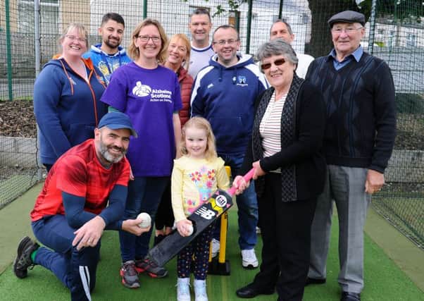 Alzheimer Scotland has teamed up with cricket club members to launch a groundbreaking dementia-friendly scheme.