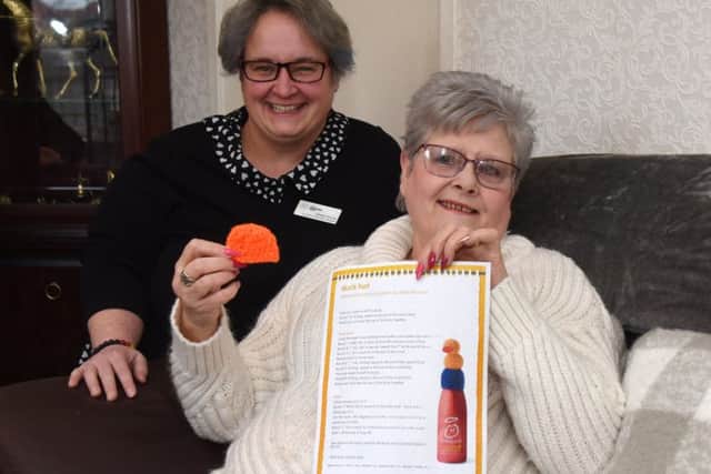 Naomi Kenny (left), librarian with Falkirk Community Trust, pictured with Marion Deans, one of the knitters.