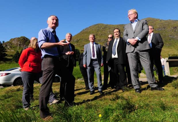 The Public Petitions Committee from the Scottish Parliament are shown improvements being made to the A83 Rest and be Thankful