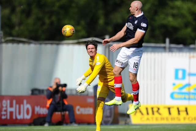 Allan Fleming attempts to throw the ball out and hits Sammon and goes straight in (picture: Michael Gillen)