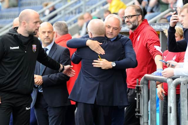 Falkirk manager Ray McKinnon with Ian Kerr, dad of Stephanie Kerr who died aged 22 earlier in the week. The club and fans will remember her with one minute applause before the game.