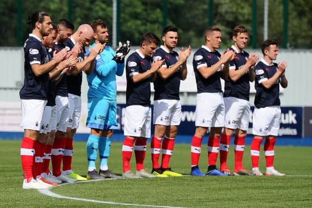 The club and fans remembering Stephanie Kerr 22 with one minute applause before the game. Stephanie died earlier in the week. (picture: Michael Gillen)