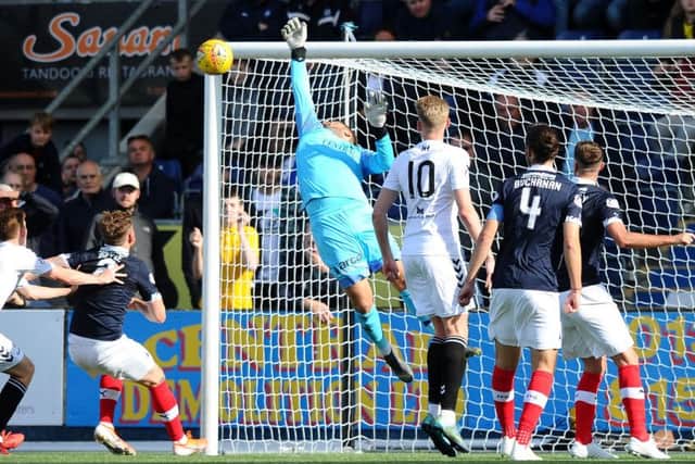 Ian Campbell goes close with a Montrose freekick near the end of the game.