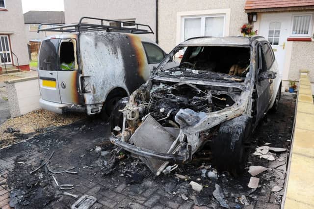 One of the damaged vehicles in Bruart Avenue