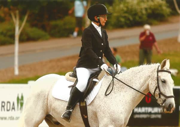 Accomplished rider...Anne Brown from Carron is well-known in RDA circles for her cheeky tattoo but it was her skills that took centre stage at Hartpury.