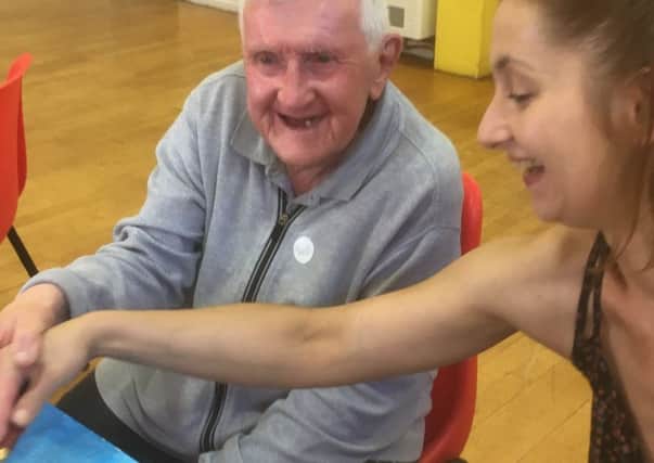 Group member Jimmy Ritchie with art teacher Kasia Lambert.