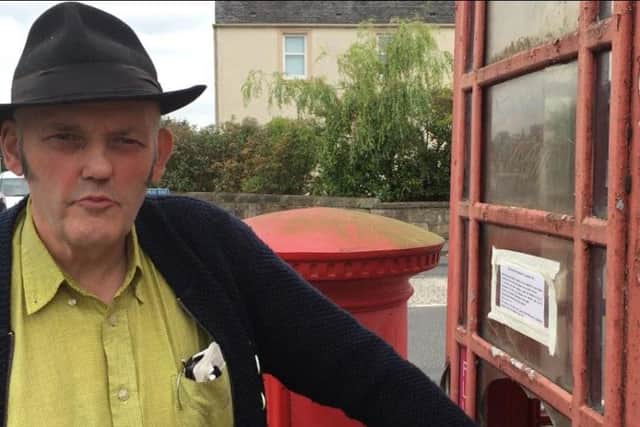 Campaigner Duncan Comrie is fighting to preserve Falkirk's few remaining public telephone boxes