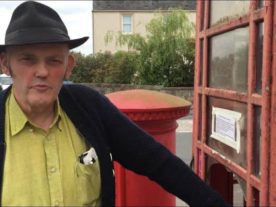 Campaigner Duncan Comrie is fighting to preserve Falkirk's few remaining public telephone boxes