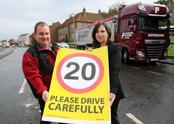 Gordon Carlton, Paterson transport manager and Councillor Laura Murtagh in Airth. Picture by Michael Gillen.