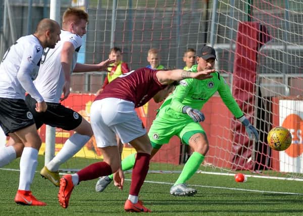 Mark McGuigan (Stenhousemuir) can't find a way through the Edinburgh City defence (picture: Dave Johnson)