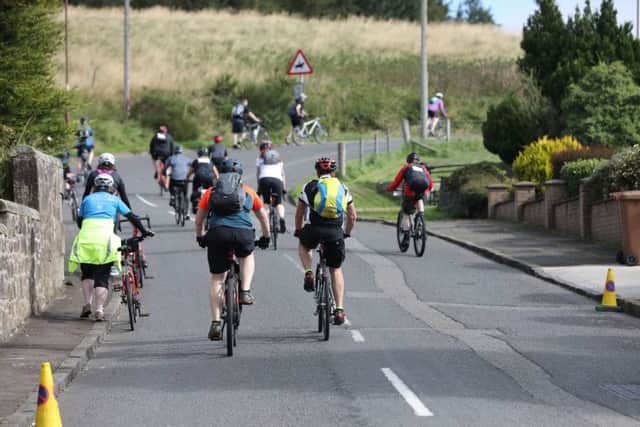 Pedal for Scotland passing through Avonbridge. Pic: Jamie Forbes