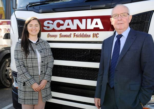 Lynsey Mitchell, Mitchell Haulage admin assistant, and Robert Frickleton Jack at the naming ceremony