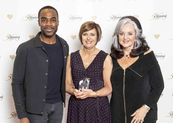 Banknock and Carron Slimming World group leader Claire Aitkenhead with TV Presenter Ore Oduba and Slimming Worlds founder Margaret Miles-Bramwell OBE.