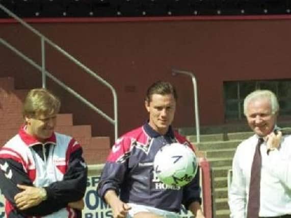 Jim Jefferies and Bairns chairman David Holmes brought Simon Stainrod to Falkirk