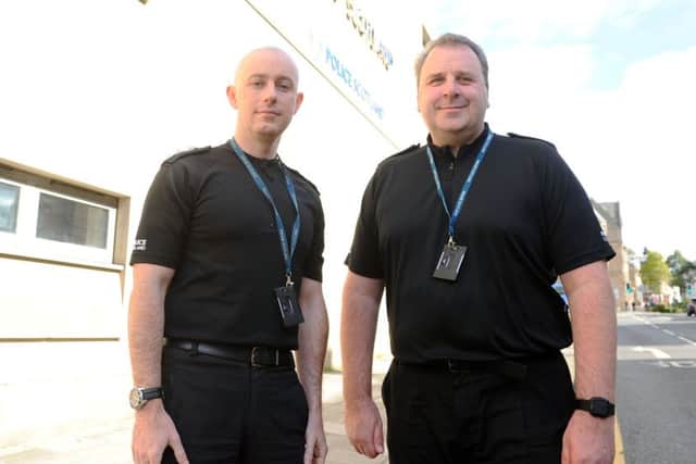 New Area Commander for Falkirk district Chief Inspector Chris Stewart (left) with previous incumbent Chief Inspector Damian Armstrong