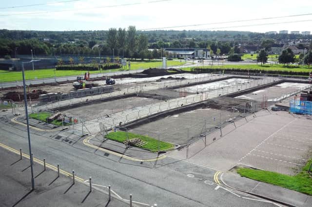 Work is well under way on an electric vehicle charging hub outside The Falkirk Stadium which will be one of many such facilities available to EV drivers throughout the region. Picture: Michael Gillen