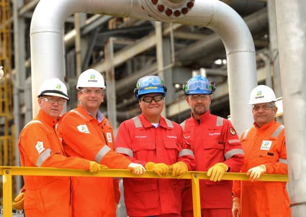 From left, Martin Beale, regional operations director (Bilfinger UK);  Alex Curr, COO (Bilfinger UK),  Jacob McAlister, plant manager (ExxonMobil), Jeroen Koutstaal, maintenance manager (ExxonMobil) and Ian King, site manager (Bilfinger UK). Pic: Walter Neilson