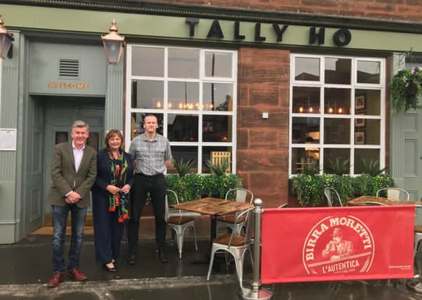Fiona Hyslop MSP, Tally Ho licensee Trevor Spence and Tom Reilly, one of Star Pubs and Bars Business Development Managers, pictured outside the Winchburgh pub.