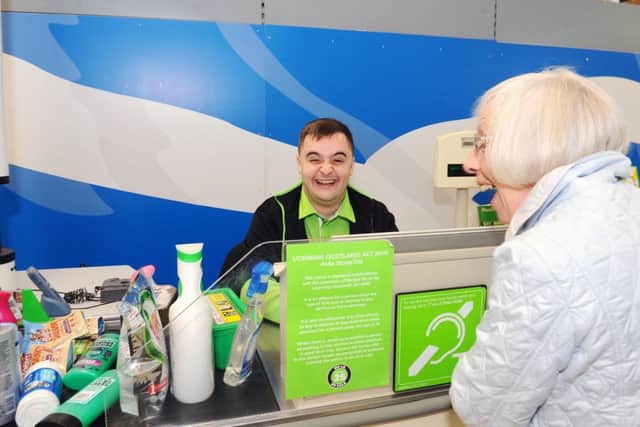 Andrew Watson with one of his customers