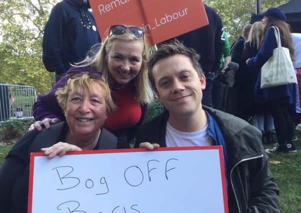 Joan Coombes (back) with Carol Lennie, also from Falkirk, and high profile Labour activist Owen Jones - during Saturday's massive protest demonstration march at Westminster in the run-up to Prime Minister Boris Johnson's latest Commons defeat.