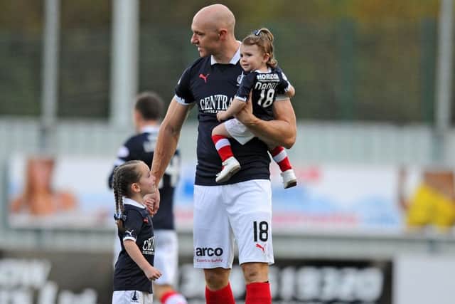 Conor Sammon 18 with his daughters.