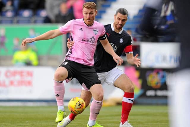 Gregor Buchanan shackles Rory McAllister