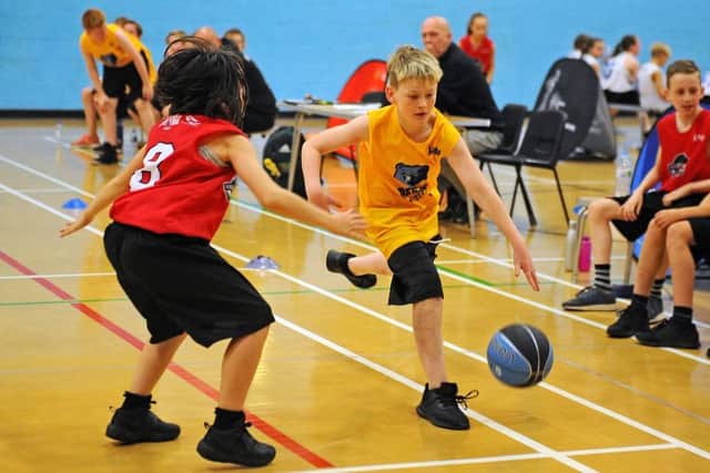 Action from the Junior NBA. Pictures: Michael Gillen