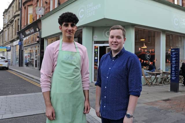 Andrew Harkins (right), owner of The Corner Cafe, is pictured alongside staff member Daniel Ait Tahar. Picture: Michael Gillen
