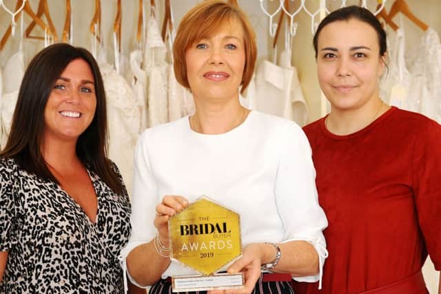Susan Kearney, sales consultant; Fiona Smart, owner and Mariia Anaieva, bridal fitter with last month's award honour -  Scottish Bridal Retailer of the Year, won at the Bridal Buyer Awards.