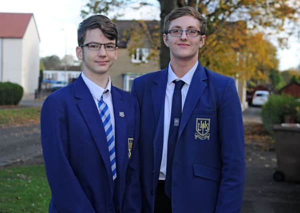 Larbert High School pupils Callum Stewart and Joshua McKinley were there for a distressed elderly woman in her hour of need. Picture: Michael Gillen