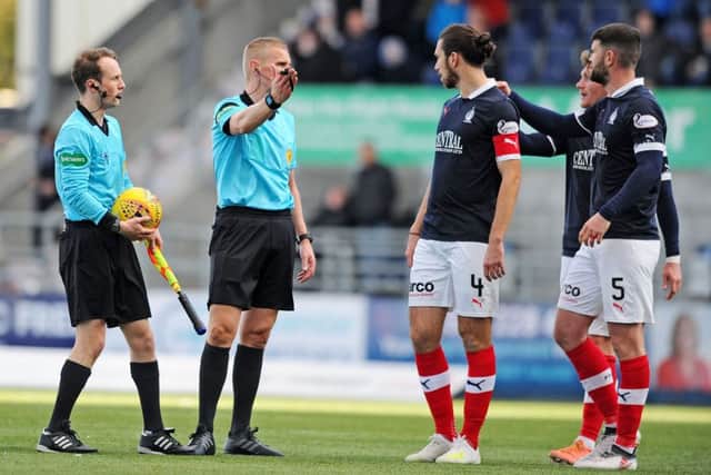 26-10-2019. Picture Michael Gillen. FALKIRK. Falkirk Stadium. Falkirk FC v Clyde FC. Matchday 11. SPFL Ladbrokes League One. Gregor Buchanan 4 and Mark Durnan 5 question referee, Mike Roncone about his first half performance.