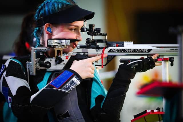 Scotland's Seonaid McIntosh competes during the women's 50m rifle 3 positions shooting final ( / AFP PHOTO / Patrick HAMILTON via Getty Images)