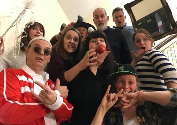 The Linlithgow Players are gearing up for their upcoming patomime, Snow White. Pictured: Snow White with apple, played by Suzanne Hogg centre and 'Lithgae rappers' Fred and Frankie at front, played by Les Fulton and Erika Oulton.