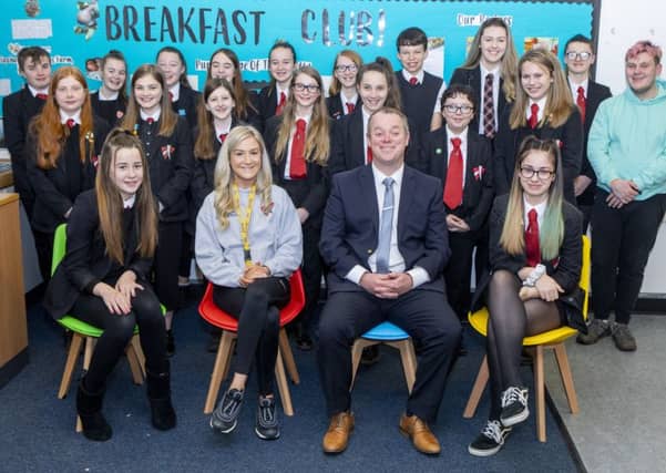 Braes High headteacher Iain Livingstone (centre) congratulates the breakfast club. Picture: SWNS