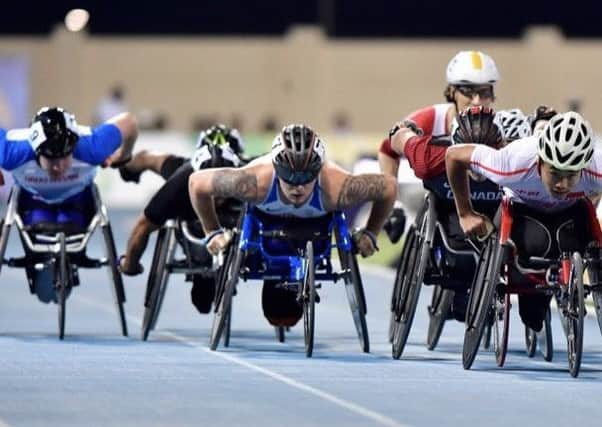 Paralympic hopeful Ben Rowlings from Linlithgow, pictured (centre) in action at the World Championships..