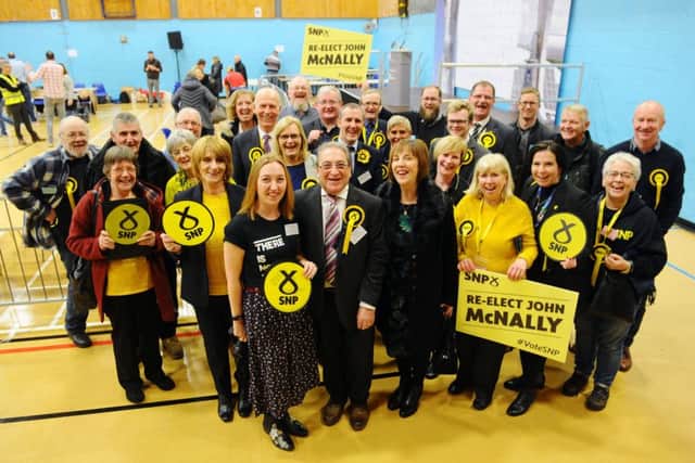Johnny McNally and his SNP supporters after the announcment he had been re-elected to represent Falkirk