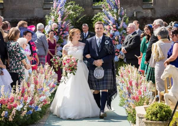 Kirsty Sievwright and Gery Brownholtz from Washington D.C., were married at Dundas Castle near South Queensferry on August 2, 2019.