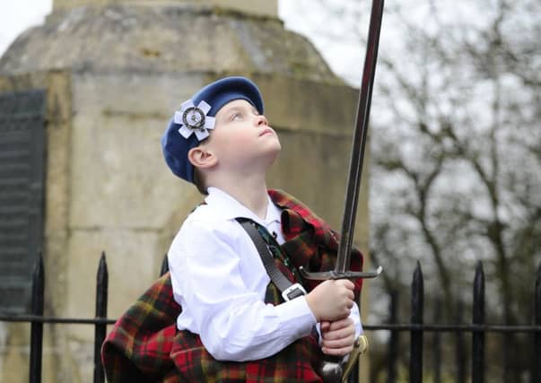 Young historical re-enactor Raif Brown (9) at last year's commemoration event.