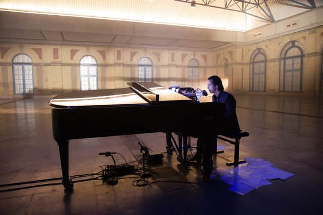 Nick Cave performing at Alexandra Palace in London in June (photo: Joel Ryan)