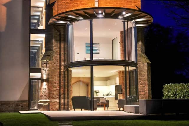There are full-height, curved-glass windows on the ground and first floors. (Picture: Rightmove)